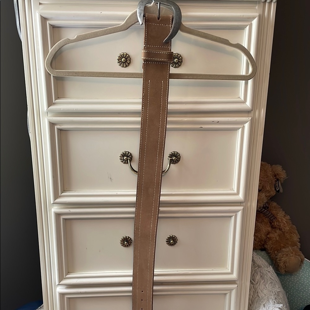 Free People Tan with Silver buckle wide belt.  The buckle is unique.